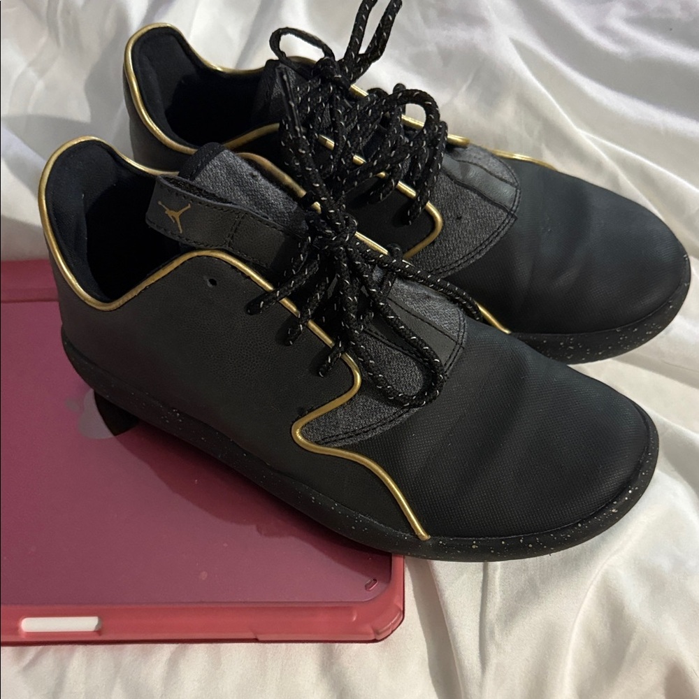 Jordan Black Sneakers with Gold Accents